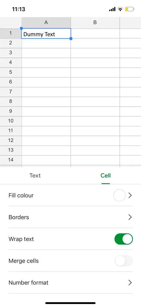 Google Sheets mobile app showing the Cell tab with the Wrap text toggle switched on